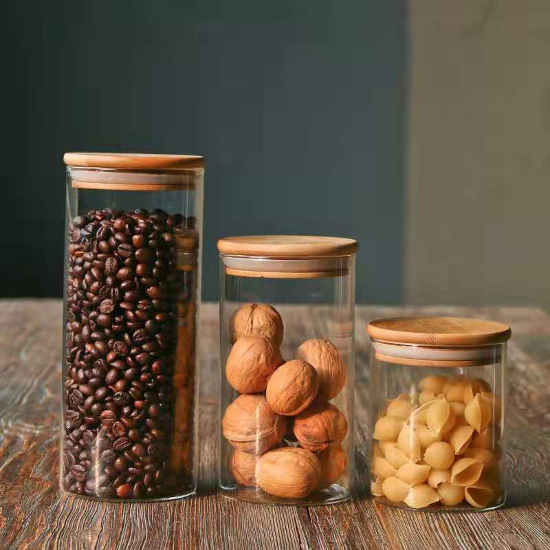 Wholesale tea cans heat-resistant glass sealing cans transparent storage tank dried fruit snack storage bottle candy cans bamboo cover.
