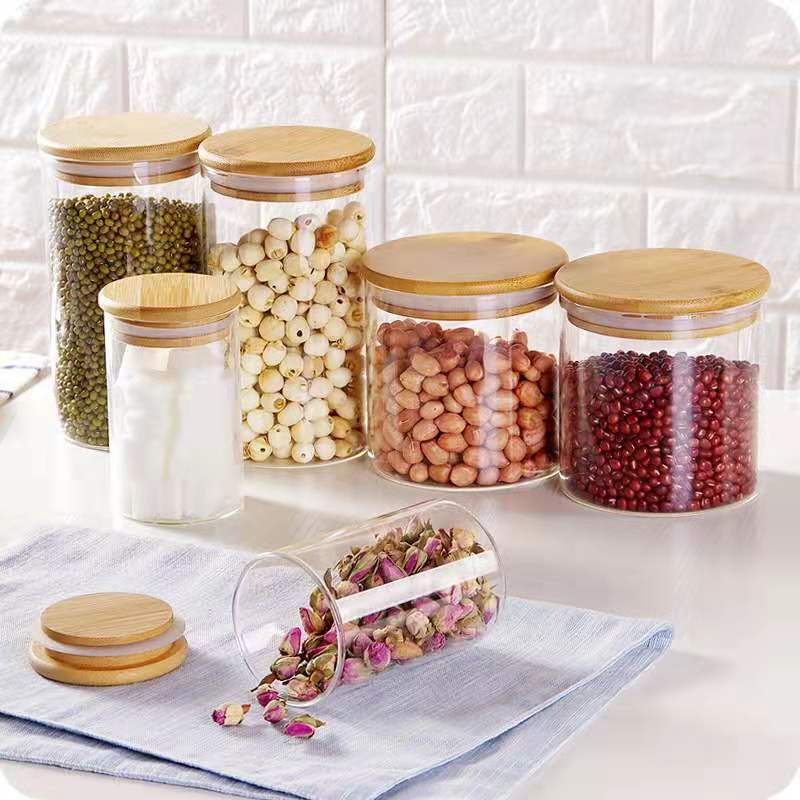 Wholesale tea cans heat-resistant glass sealing cans transparent storage tank dried fruit snack storage bottle candy cans bamboo cover.
