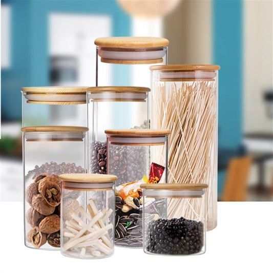 Wholesale tea cans heat-resistant glass sealing cans transparent storage tank dried fruit snack storage bottle candy cans bamboo cover.